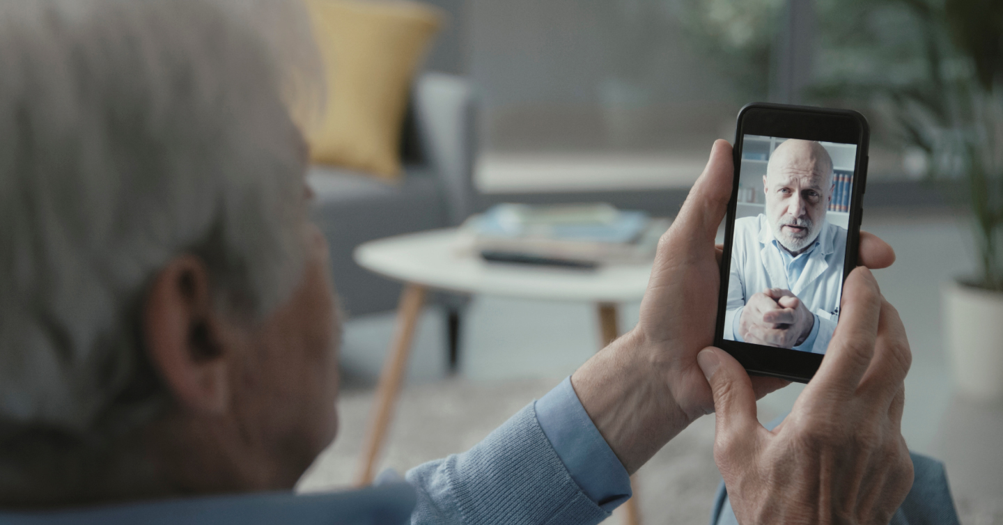 person talking to their doctor in a virtual appointment