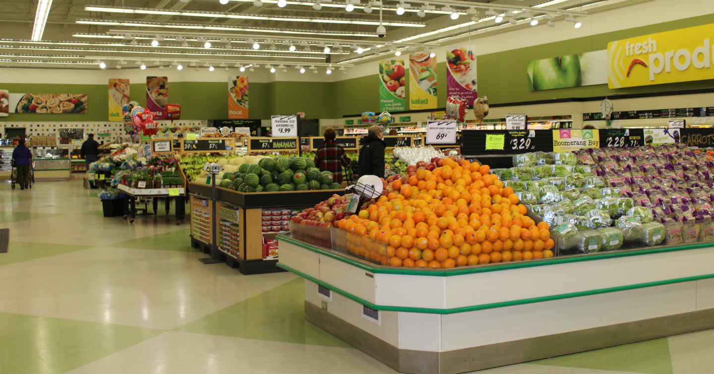 people shopping at grocery store in wisconsin
