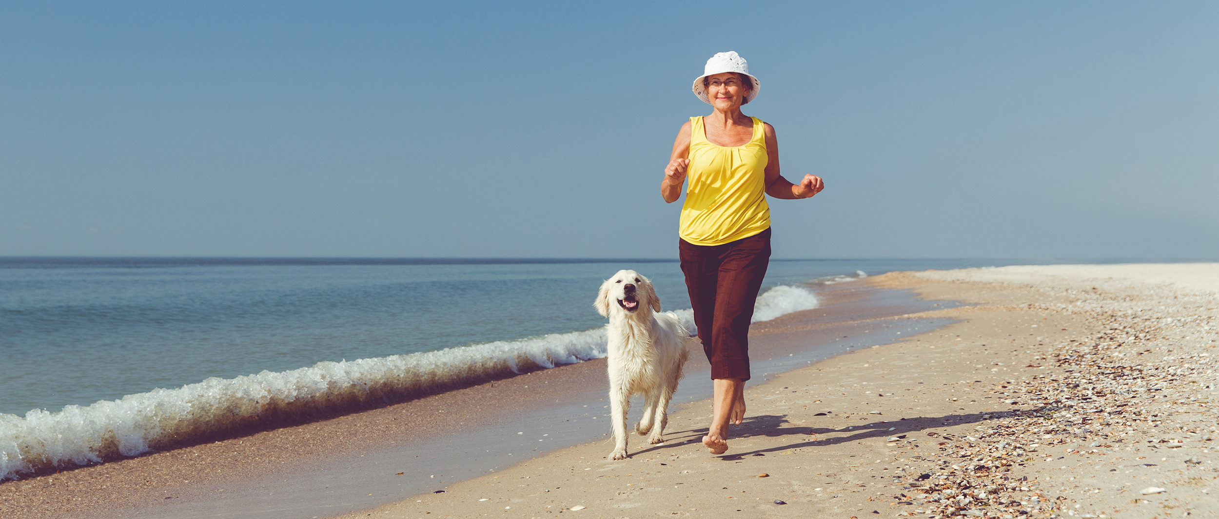 woman running on the beach