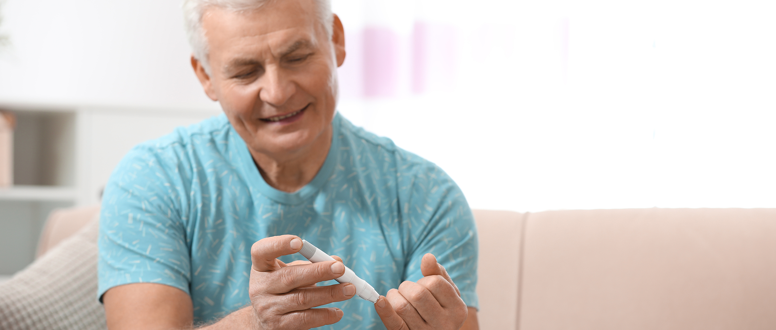 Man with diabetes checking his blood sugar