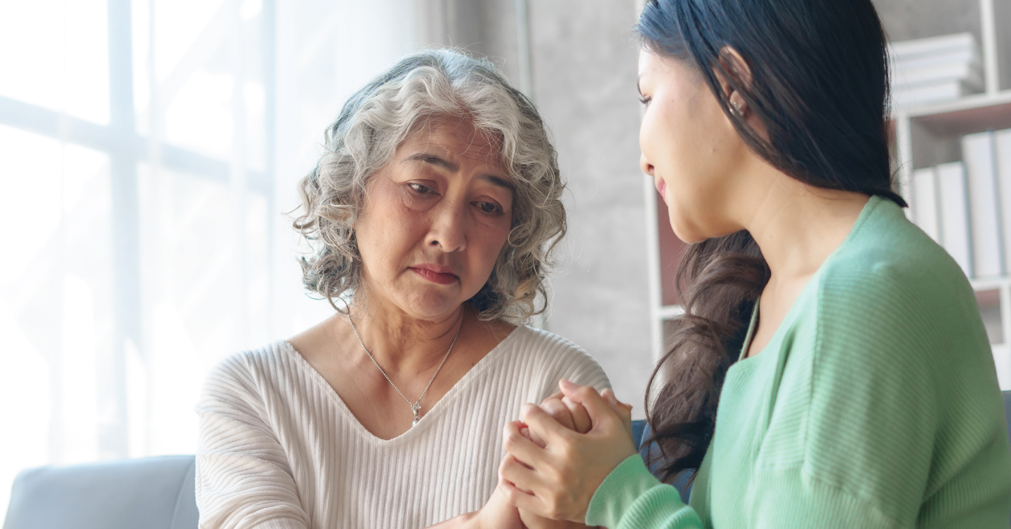 a young adult caring for a middle aged person with young onset alzheimer's