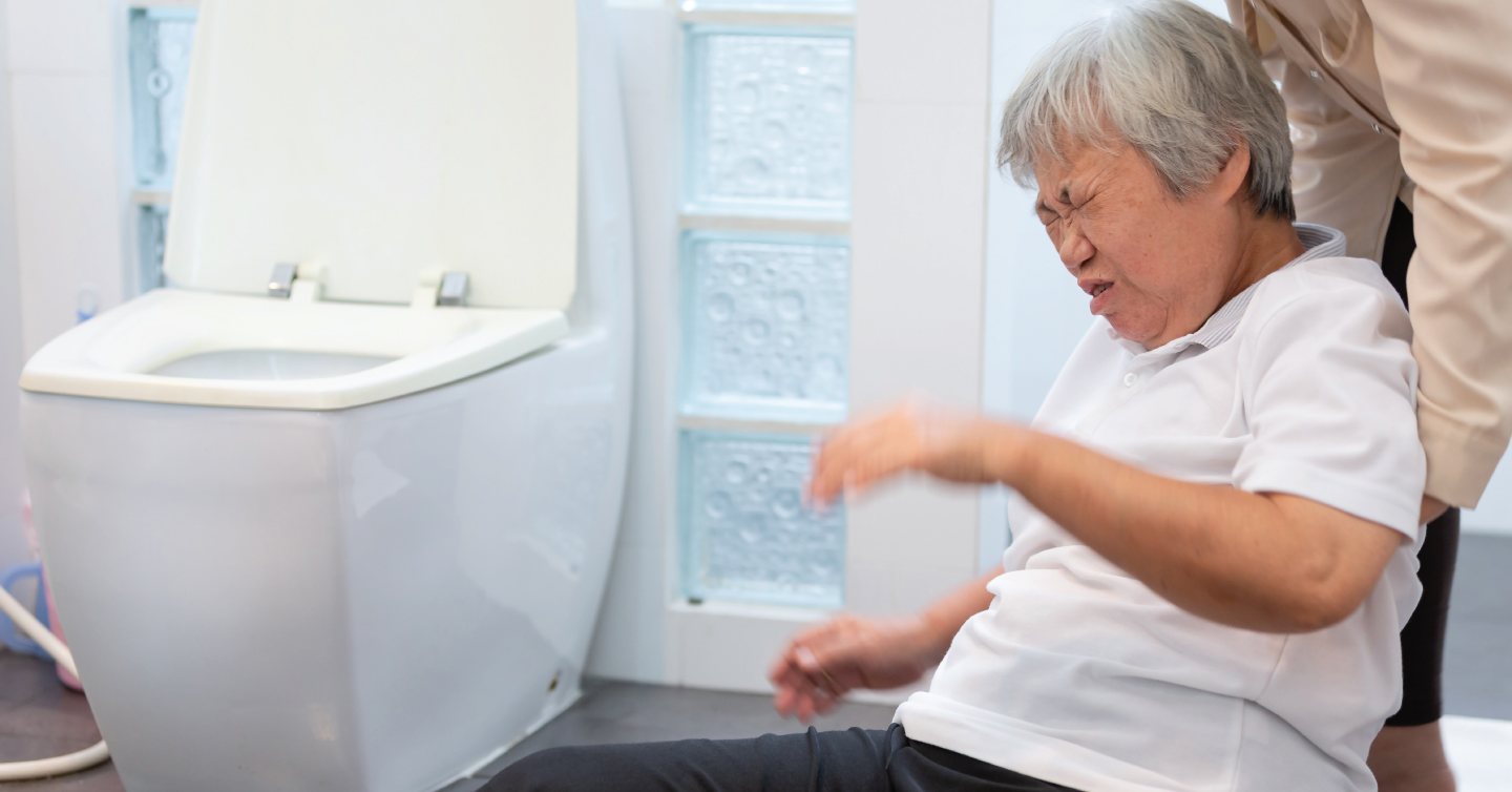 a woman struggling to make it to the bathroom