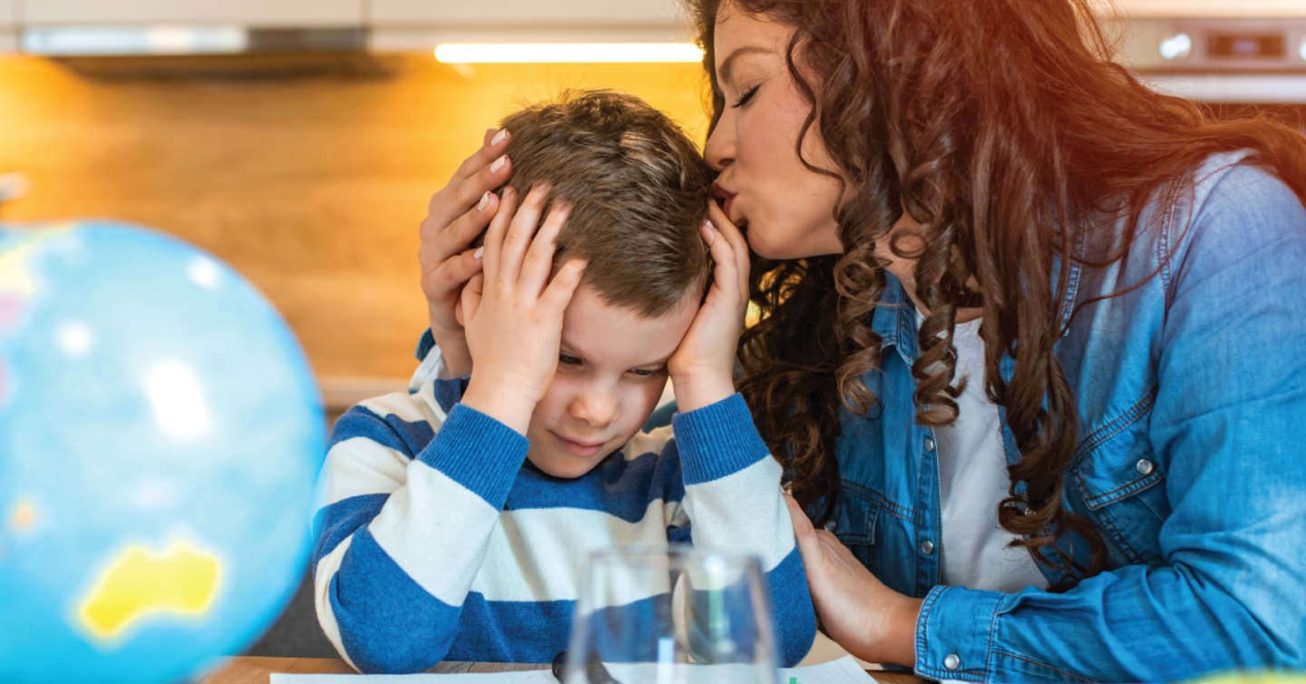 parent helping adhd child read and study
