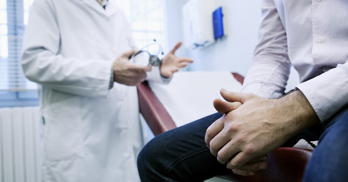 man having a health consultation with his doctor