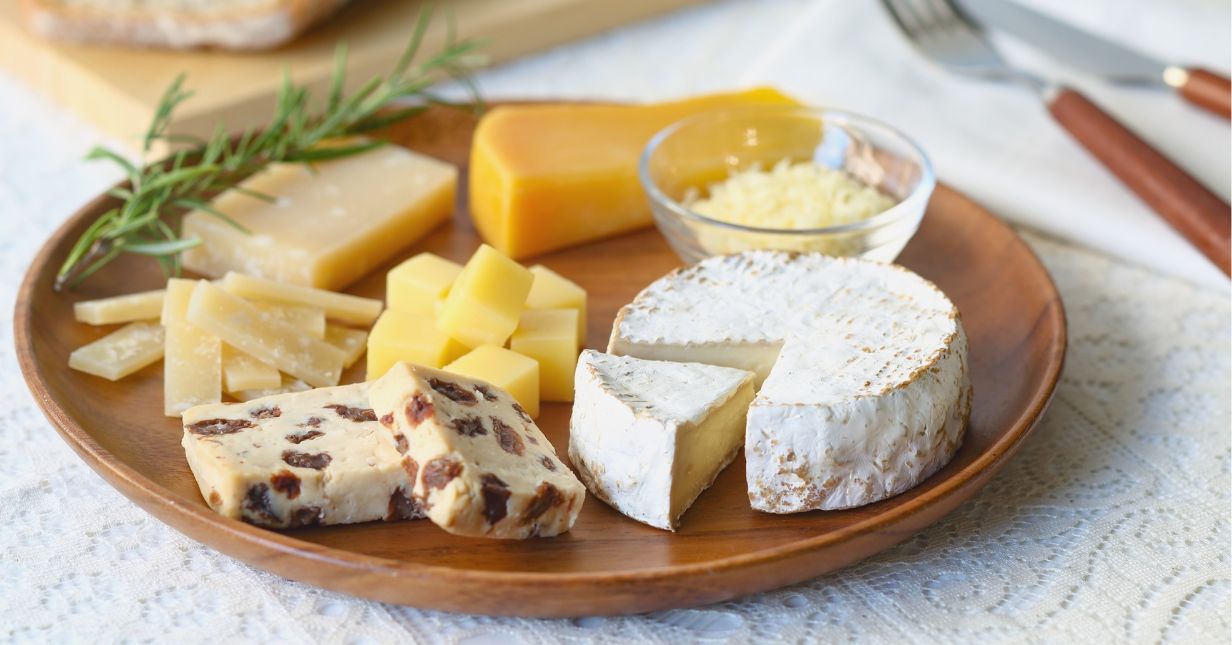 variety of cheeses on a plate