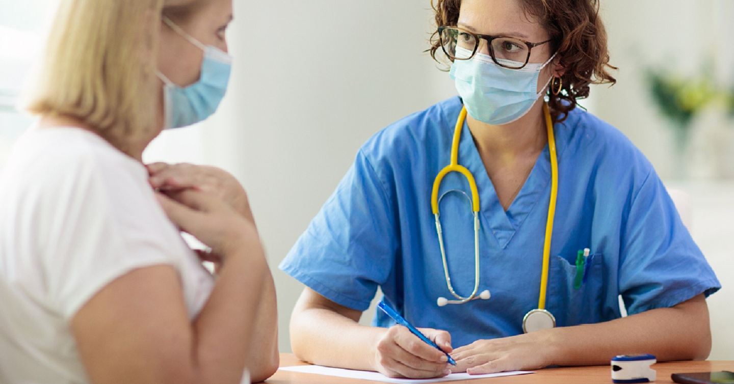 doctor and patient going over medical history
