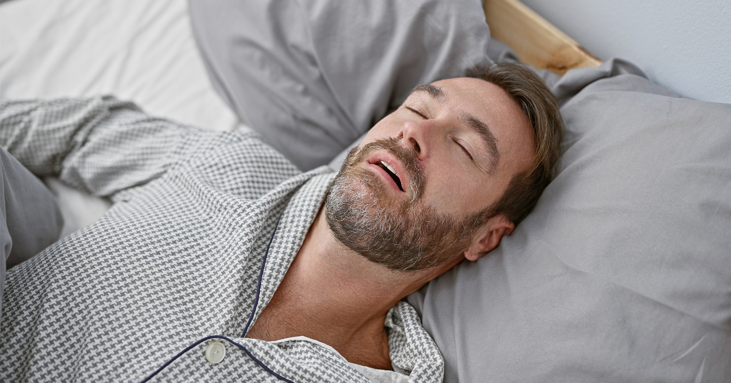 a person snoring while sleeping