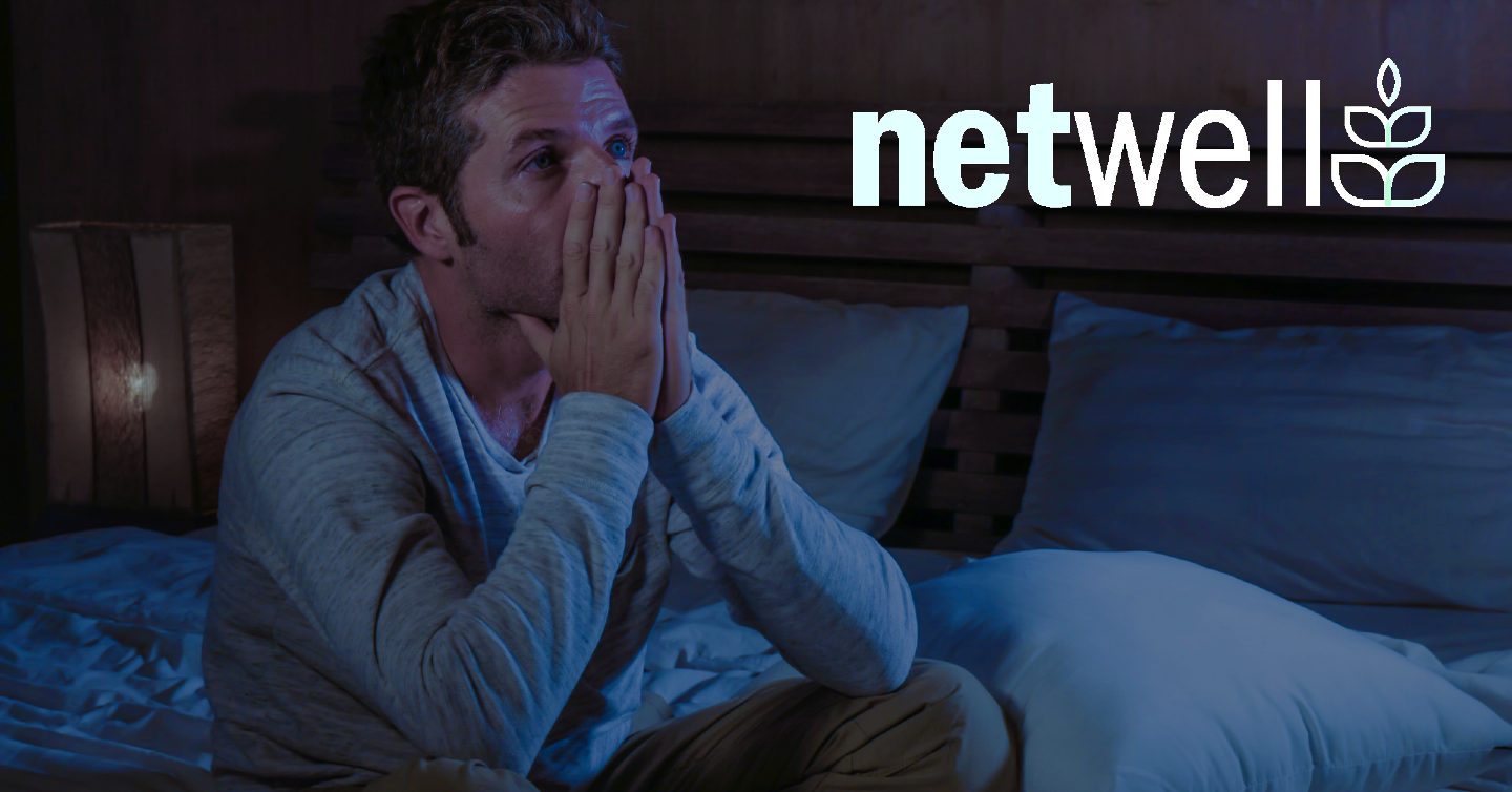 man on bed suffering from anxiety and or depression