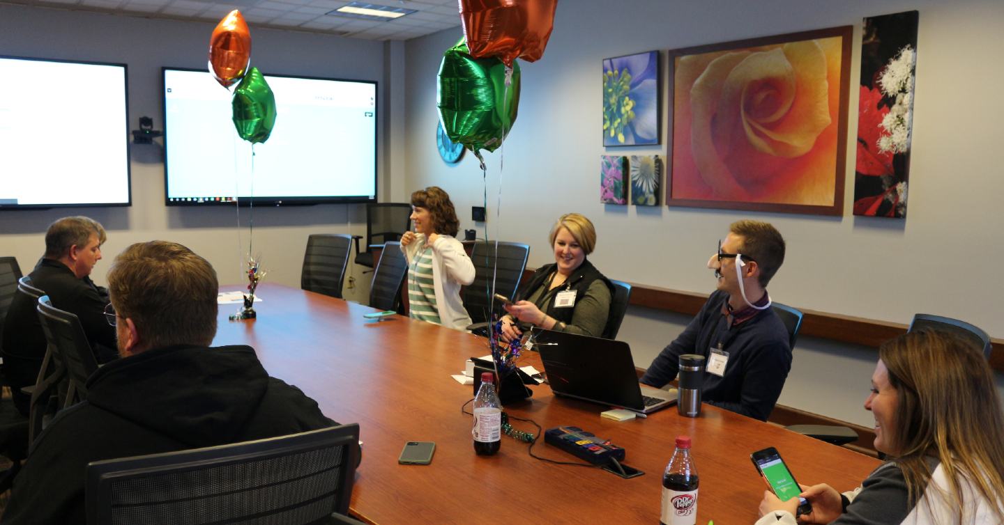group of employees at network health having a fun time