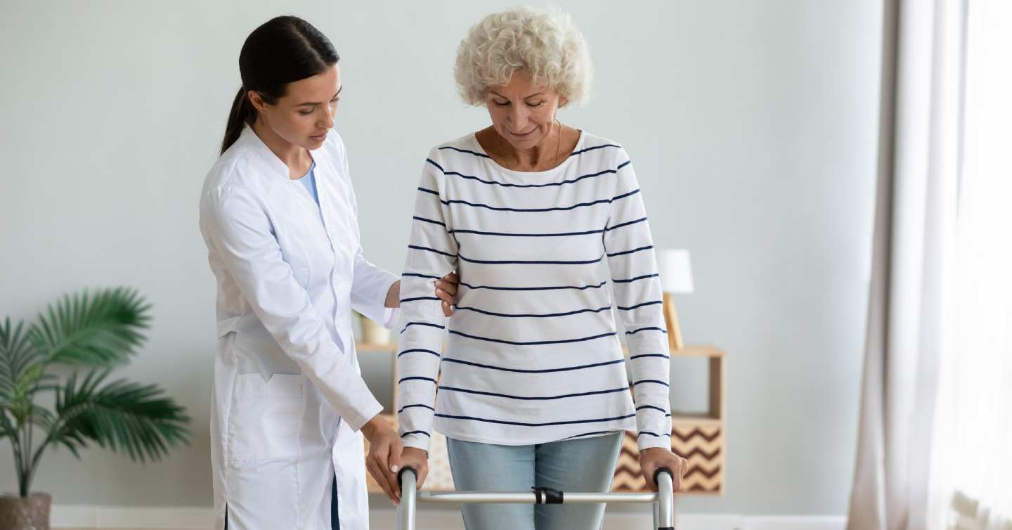 physician assisting woman who has been through an osteoporosis fracture